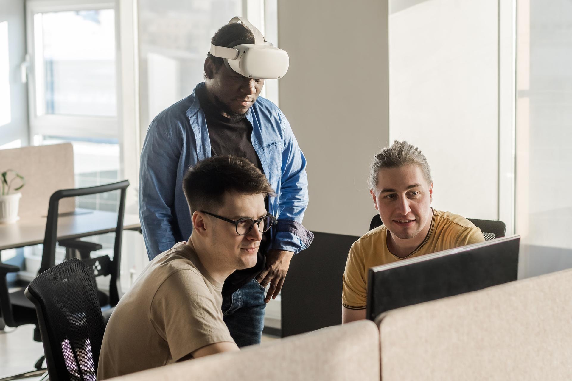 A development team reviewing work together